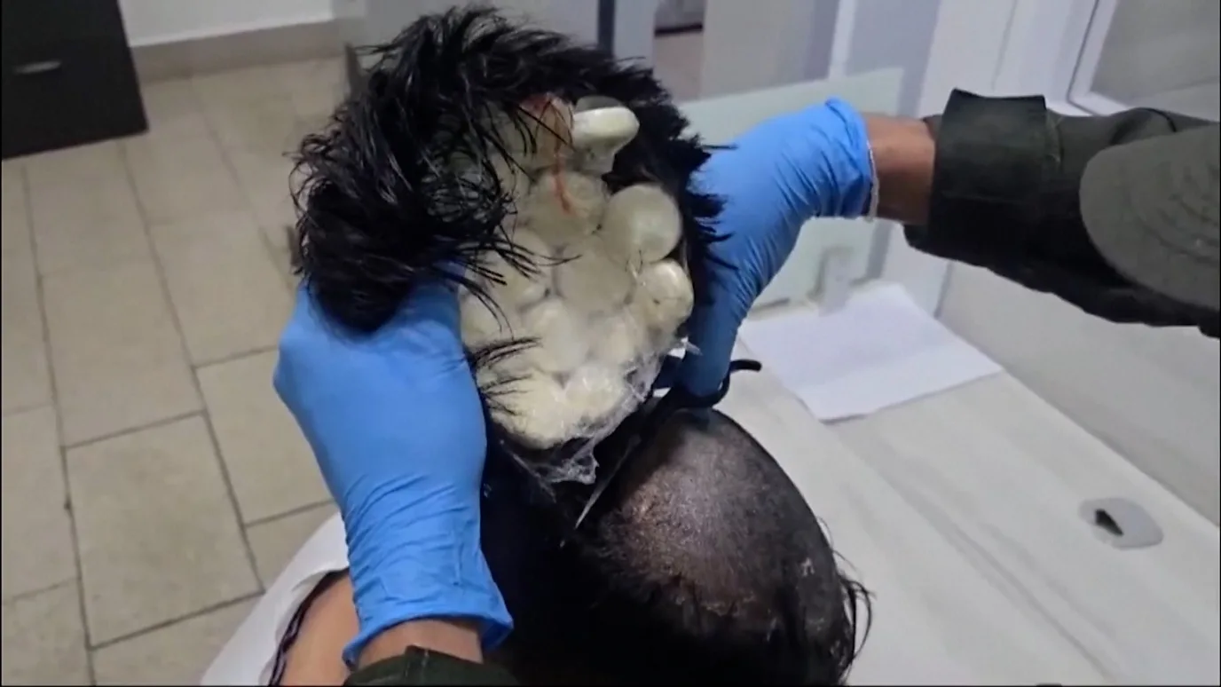 Man Caught Smuggling Cocaine Under Wig at Colombian Airport