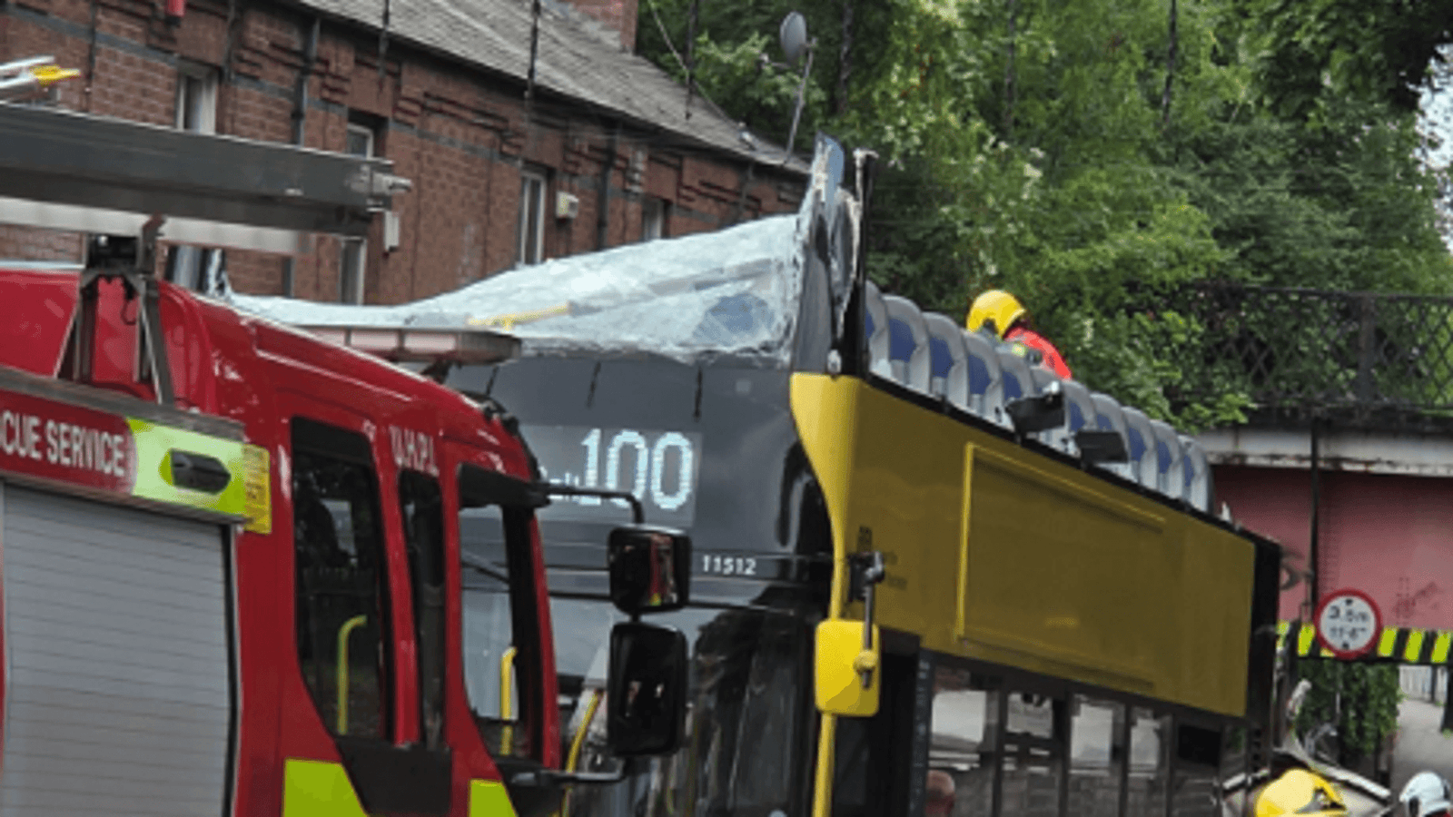 Double-Decker Bus Crashes Into Railway Bridge in Manchester